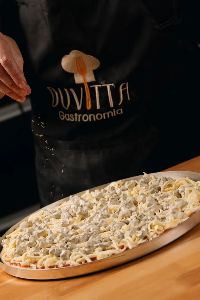 Pizza artesanal preparada pela Duvitta